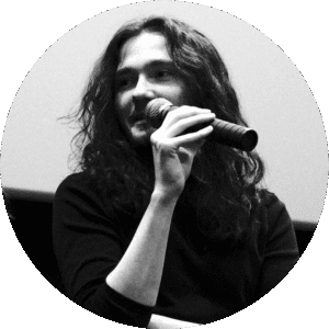 Michael J. Kepligner, microphone in hand, during a Q&A event